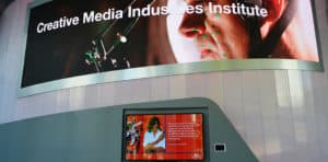 See pictures of digital signage installations, screen layout designs, custom interactive and room signs