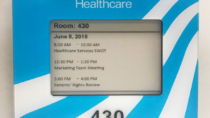 Crystal Run Healthcare electronic paper room sign with standard schedule template and custom faceplate