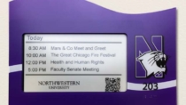 Visix E-Paper Room Sign with a custom frame design for Northwestern University