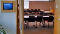 Kauffman Foundation using Touch10 Interactive Room Signs from Visix outside meeting rooms