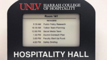 UNLV Harrah College of Hospitality EPS 74 room sign from Visix with custom frame