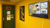 Vermeer Digital Sign in lobby grabs attention with graphics and weather