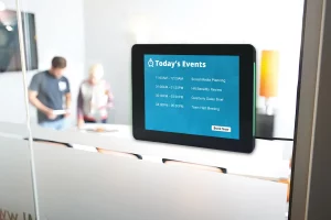 Digital Meeting Room Signs from Visix show schedules, messaging and alerts outside shared spaces