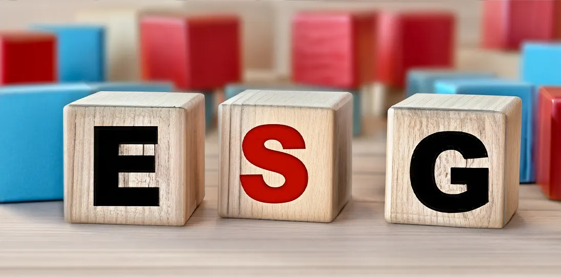 Wooden blocks showing ESG: ESG stands for Environmental, Social and Governance
