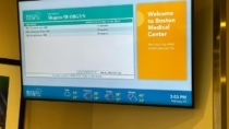 Digital signage screen showing wait times at Boston Medical Center