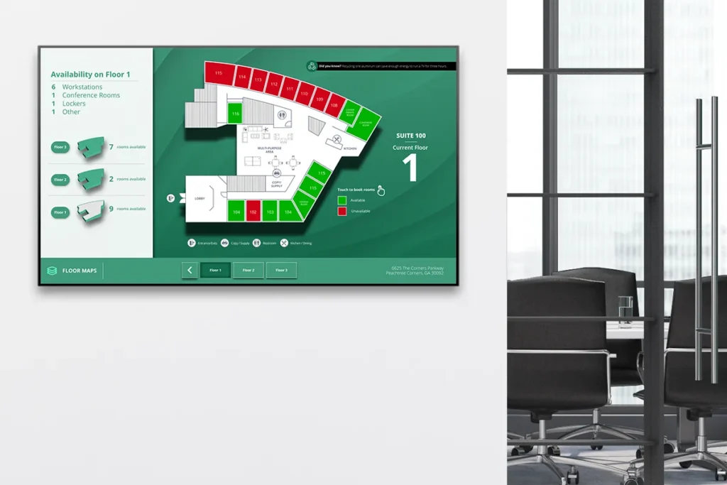 hybrid office setting with interactive screen showing workspace wayfinding