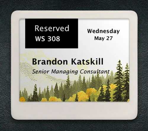 ePaper desk sign with desk reservation data on graphic background showing mountainside with trees