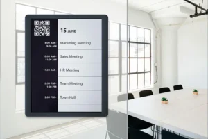 EPS 125 epaper room sign showing schedule with QR code for booking rooms
