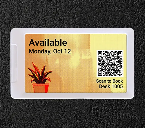 ePaper desk sign with plant background graphic and QR tag to make desk reservations