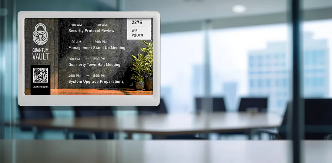 Digital room sign mounted on glass outside conference room space showing daily meetings list